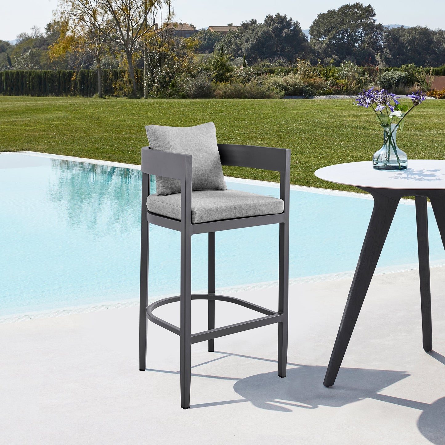 Argiope Outdoor Patio Counter Height Bar Stool in Aluminum with Gray Cushions