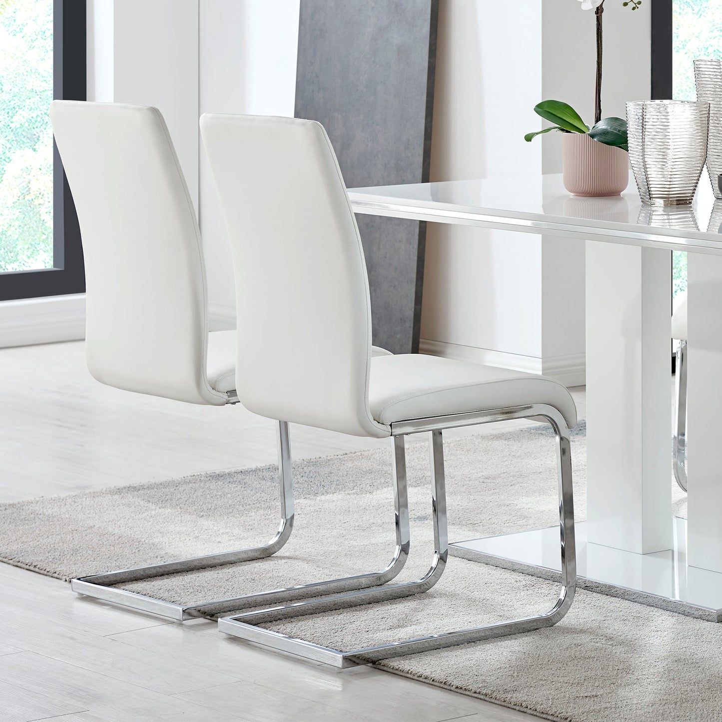 Amanda Contemporary Side Chair in White Faux Leather and Chrome Finish - Set of 2